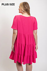 Textured woven tiered dress with tassel tie and pockets